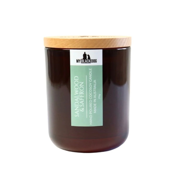 Candle with a wooden lid and label on a white background